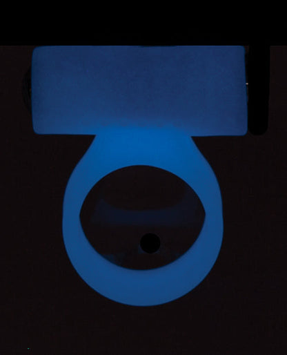 Blue plastic component on a black background
