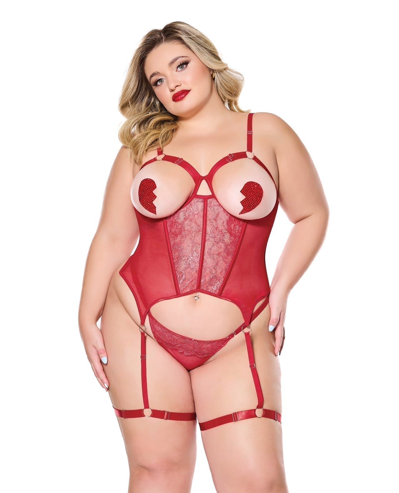 Model wearing a red lingerie set on a white background
