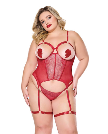 Model wearing a red lingerie set on a white background
