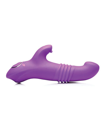 Purple dog toy with a white background