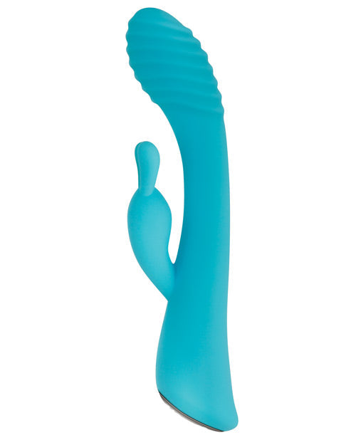 Turquoise silicone wand on a white background