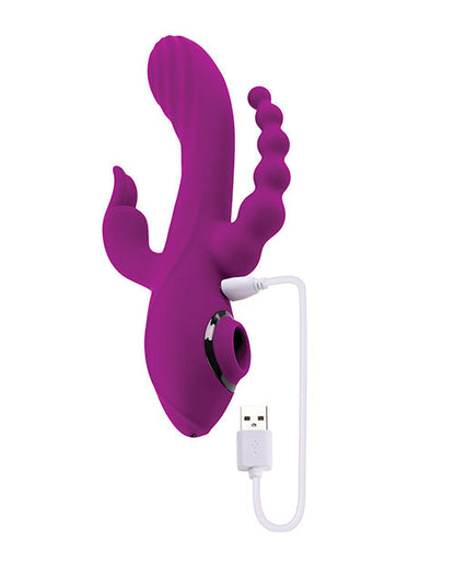 Purple silicone product with USB cable on a white background