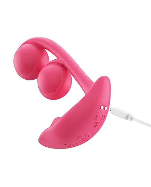 Pink earbud headphones on a white background