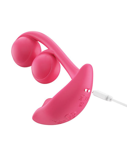 Pink earbud headphones on a white background