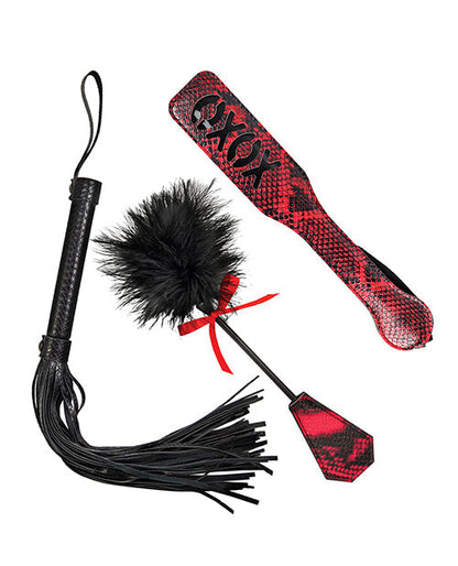 Black and red flogger with snake pattern on a white background