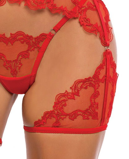Red lace lingerie set on a white background