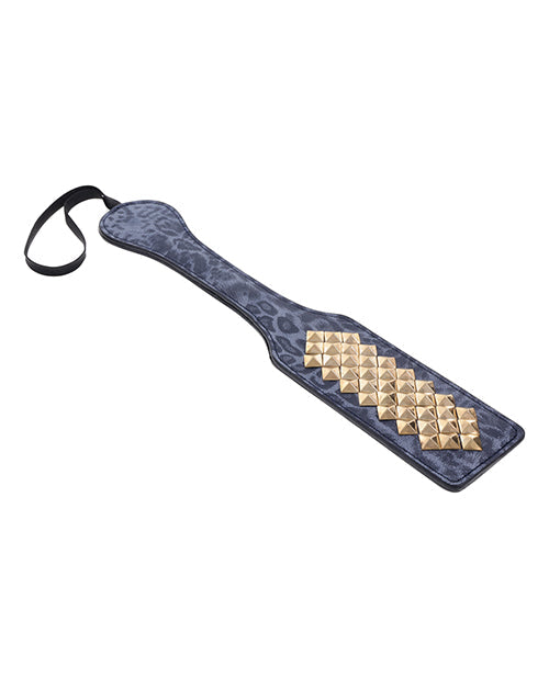 Blue leather paddle with gold pyramid pattern on a white background
