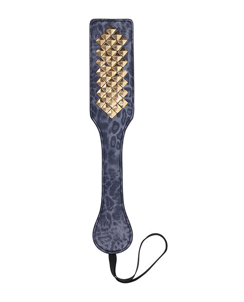 Paddle with gold pyramid pattern on a white background