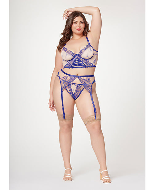Woman wearing a blue lace lingerie set on a white background