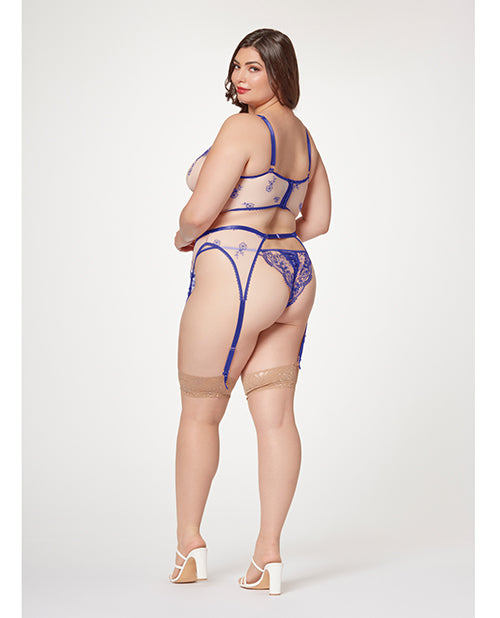 Woman wearing a blue lace lingerie set on a white background