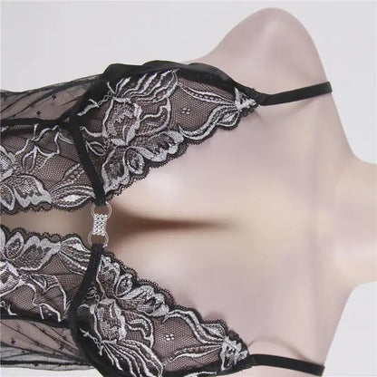 Black lace lingerie on a mannequin against a neutral background