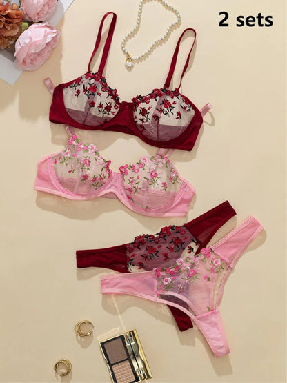 Two sets of floral lingerie on a beige background with makeup and jewelry.