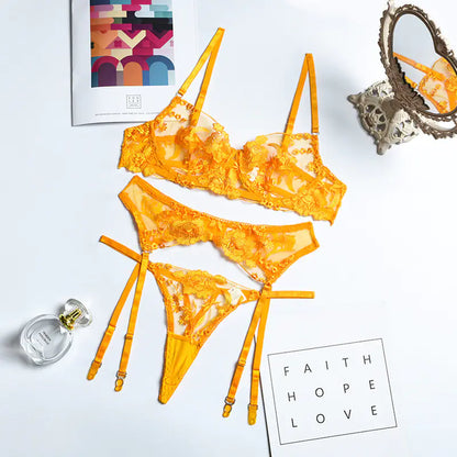 Orange lace lingerie set on a light gray background with 'Faith Hope Love' text.