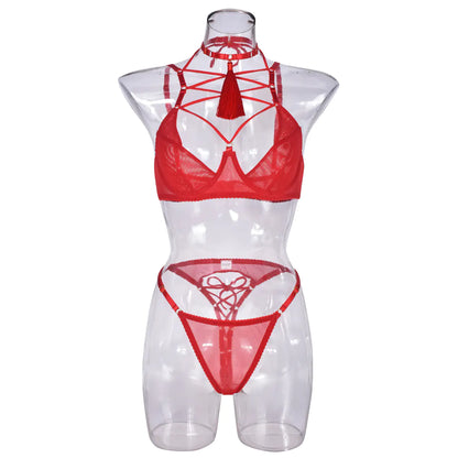 Red lingerie set on a transparent mannequin against a white background